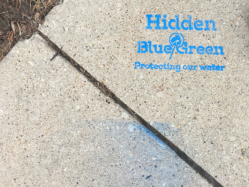 Exploring the Hidden Blue/Green text on the sidewalk