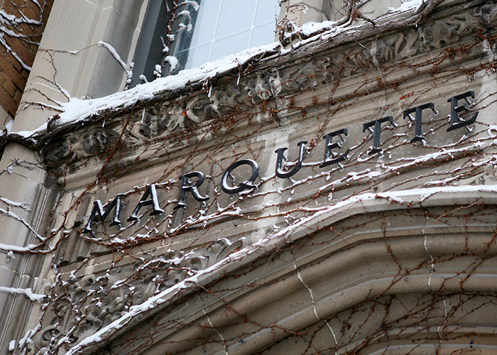 A snow covered building on the Marquette University campus